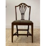 An early 19th century Hepplewhite style mahogany side chair, with pierced splat back over drop in