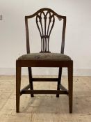 An early 19th century Hepplewhite style mahogany side chair, with pierced splat back over drop in