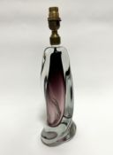 A mid century amethyst cased glass spiral table lamp, unmarked, (29cm x 16cm)