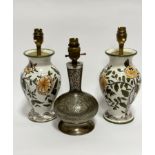 A pair of Constancia Portuguese pottery baluster vase table lamps, decorated with chrysanthemum