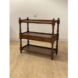 A Victorian mahogany three tier what not, fitted with a drawer, on turned supports, H104cm,