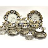 A Victorian china twenty eight piece tea and coffee service, including two cake plates, a bread