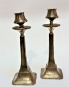 A pair of Birmingham silver Art Nouveau style candlesticks with weighted wooden bases, (22.5cm x 7.