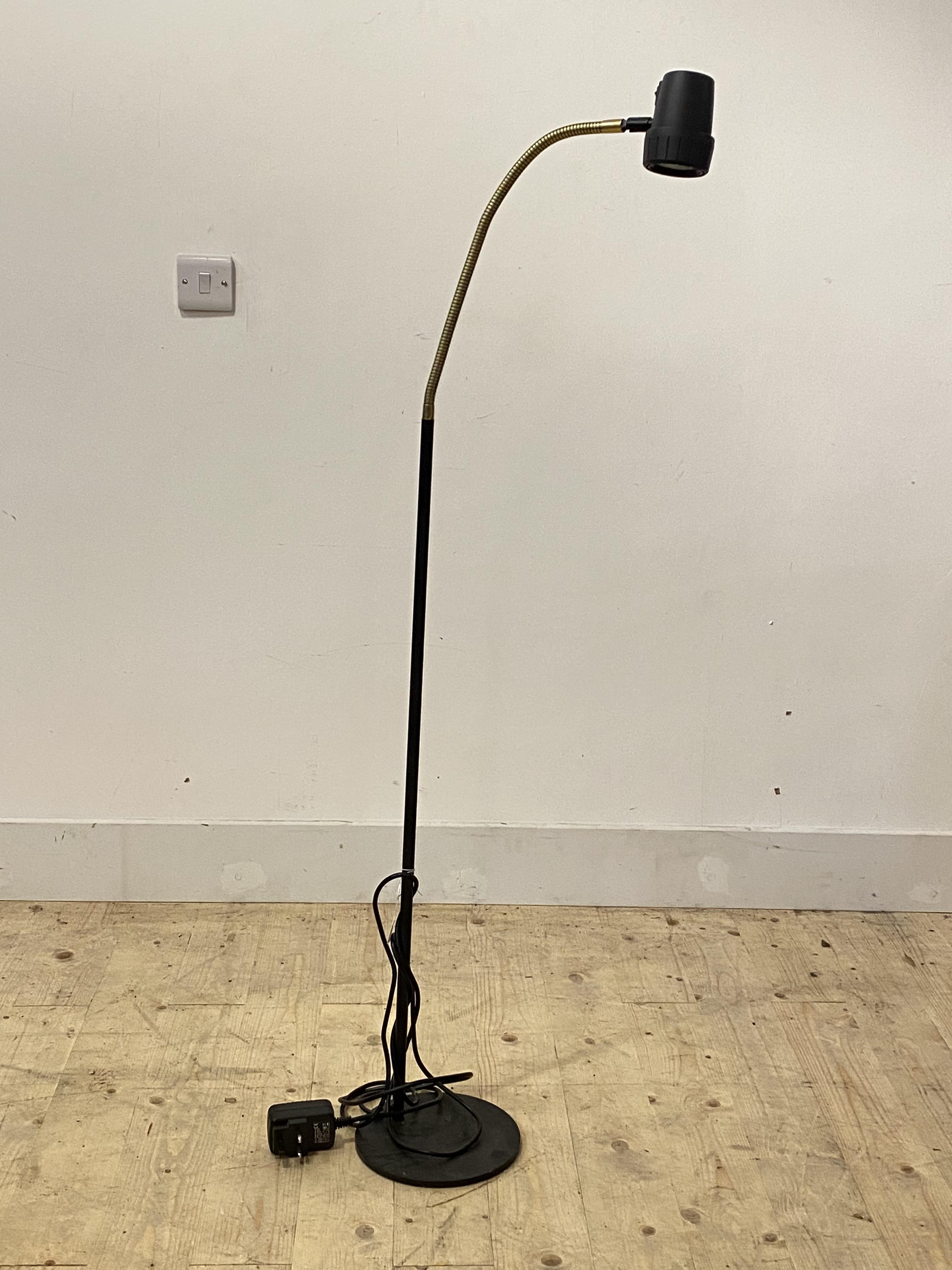 A modern andle adjustable lamp standard, H140cm