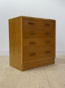 G-plan, A mid century 'Brandon' range light oak chest with four graduated drawers, H85cm, W77cm,