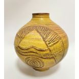 A Hassall of Dunbar pottery onion shaped vase with circular pattern with triangle and swirl