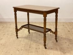 An Edwardian oak side table, the top with moulded edge and canted corners over ring turned
