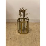 A Gilt brass hexagonal hall lantern, with inset bevelled plates enclosing four branches, H75cm