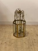 A Gilt brass hexagonal hall lantern, with inset bevelled plates enclosing four branches, H75cm