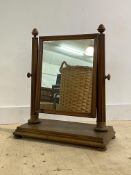 A large 19th century mahogany framed vanity mirror of country house proportions, the rectangular