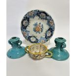 A pair of Italian Cantagalli turquoise glazed candlesticks with twin scroll handles to side and