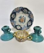 A pair of Italian Cantagalli turquoise glazed candlesticks with twin scroll handles to side and