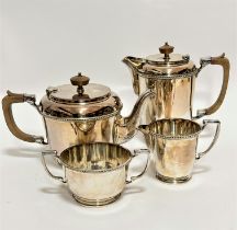 A 1930's Epns four-piece tea and coffee service with gadroon border, treen finial's and handles,