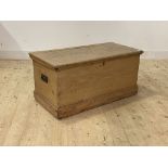A 19th century blanket box, the hinged lid enclosing candle box to interior, on a skirted base,