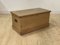 A 19th century blanket box, the hinged lid enclosing candle box to interior, on a skirted base,