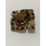 A late 19th century Scottish yellow metal mounted citrine and hardstone brooch, centred by a large