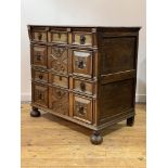 A William & Mary oak chest of drawers, c. 1700, the rectangular top over four drawers with geometric