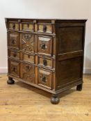A William & Mary oak chest of drawers, c. 1700, the rectangular top over four drawers with geometric