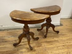 A Pair of Victorian figured walnut demi-lune card tables, the tops with boxwood string and
