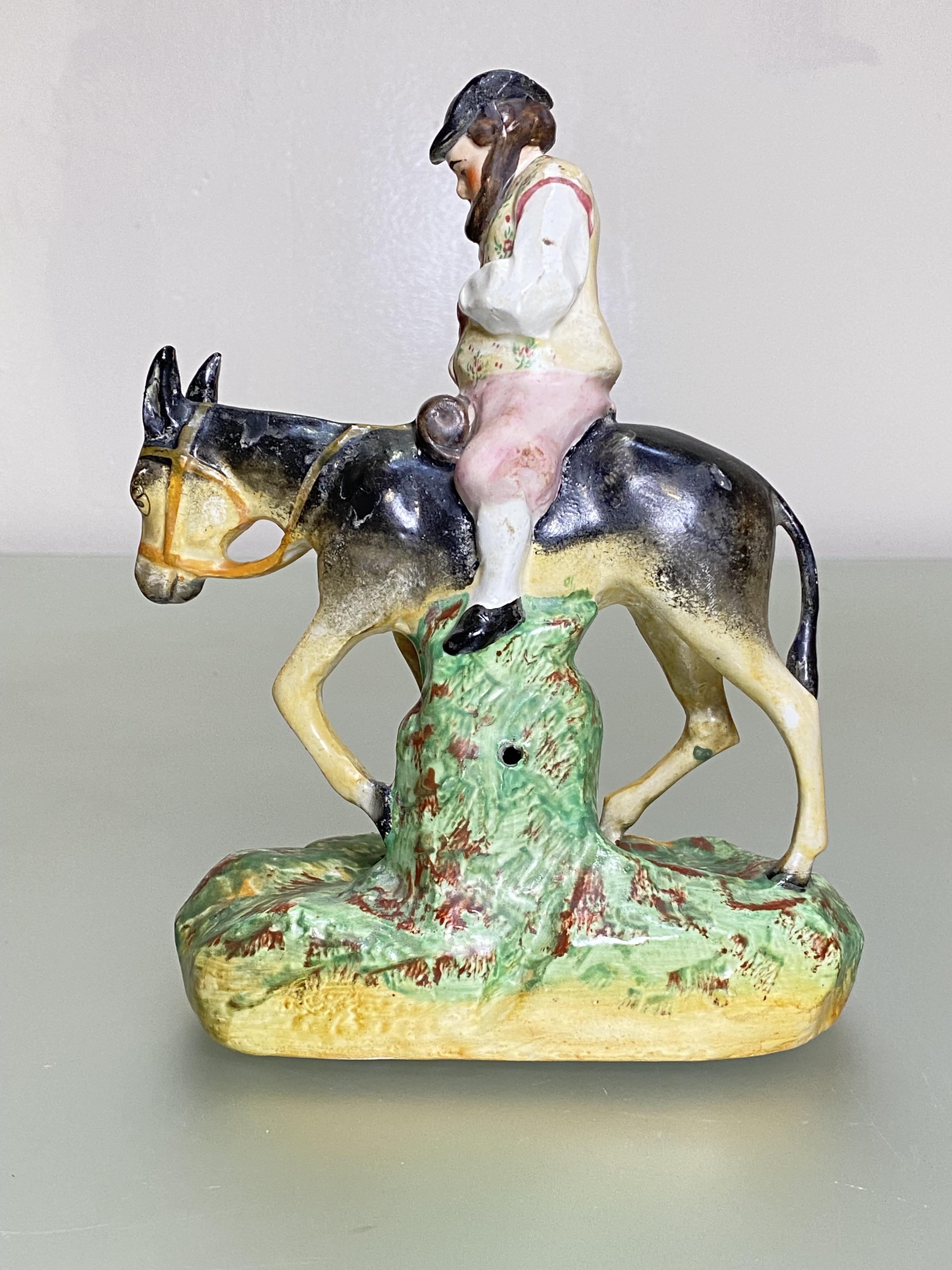 A 19th century Staffordshire figure of Sancho Panza, on a naturalistic base. Height 19.5cm - Image 3 of 5