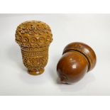 Two early 19th century treen nutmeg graters: the first, of acorn form, opening to a grille (