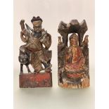 A pair of Chinese carved, painted and parcel-gilt wooden flat-back figures, of Guan Yin and