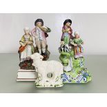 Two early 19th century Staffordshire groups: a Walton style pair of musicians, bearing title