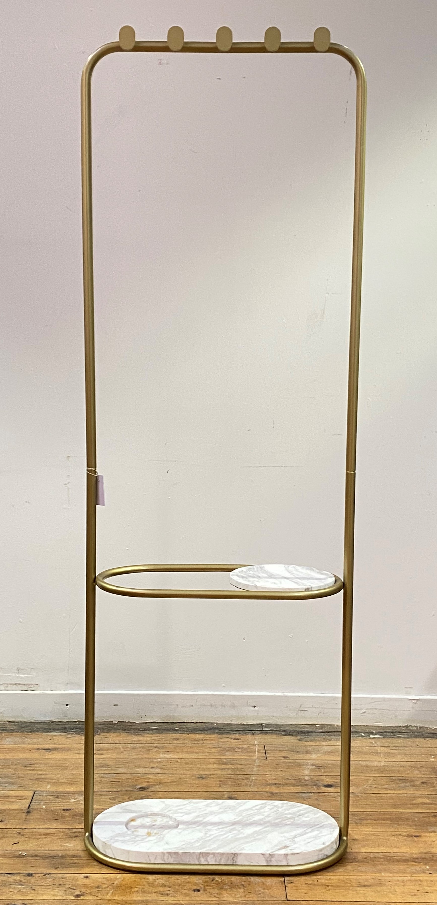 A mid-century modern hall stand, the tubular gilt frame with five coat hooks, over a dished white - Image 2 of 2