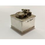 A George III silver travelling inkwell, London 1812 (maker's mark indistinct), of cube form, the