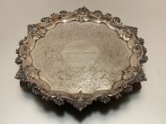 A William IV silver salver, John Welby, London 1831, the scalloped rim boldly chased with c-