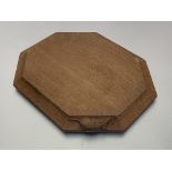 Workshop of Robert Mouseman Thompson (Kilburn): an English oak bread board, post 1960, of shaped