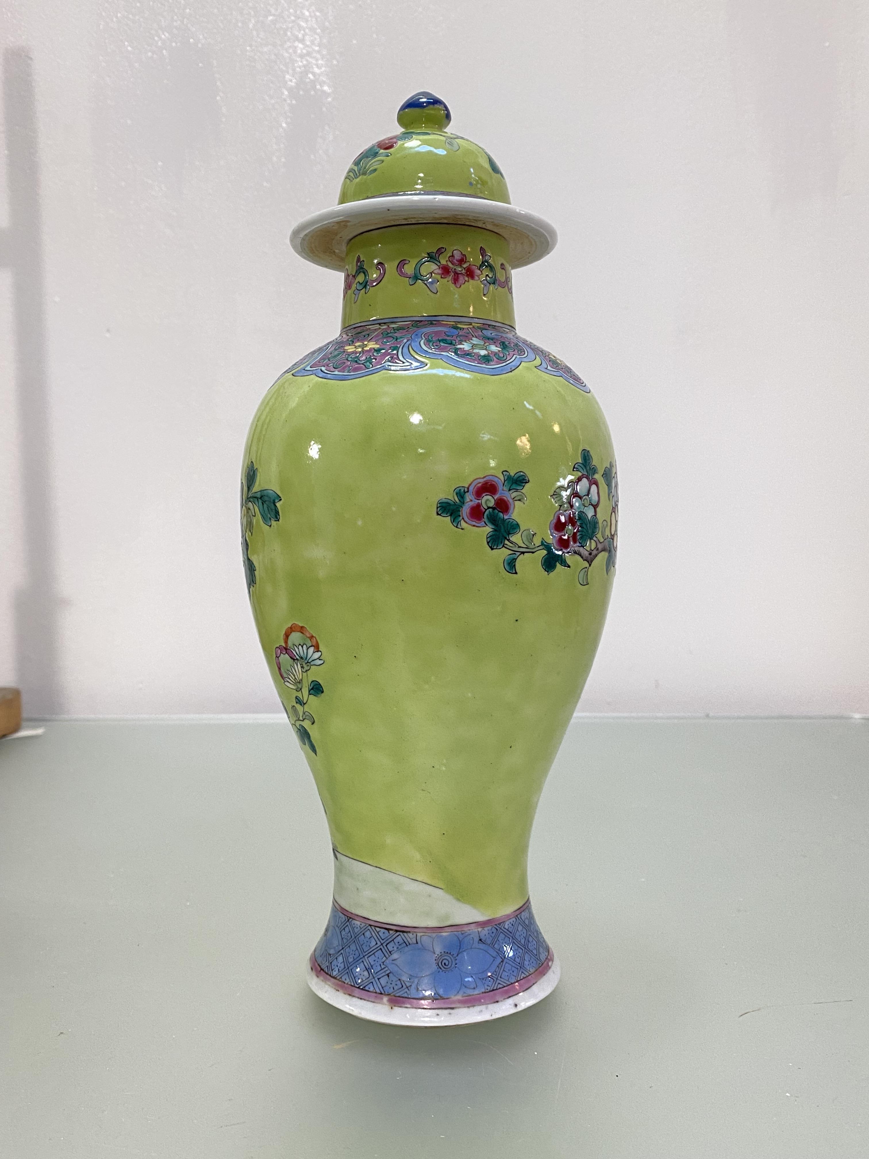 A Chinese famille rose porcelain vase and cover, of baluster form, painted with a bird perched - Image 2 of 5