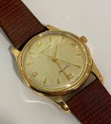 A vintage Longines gentleman's automatic wind wristwatch, the dial with Arabic and baton numerals in