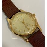A vintage Longines gentleman's automatic wind wristwatch, the dial with Arabic and baton numerals in