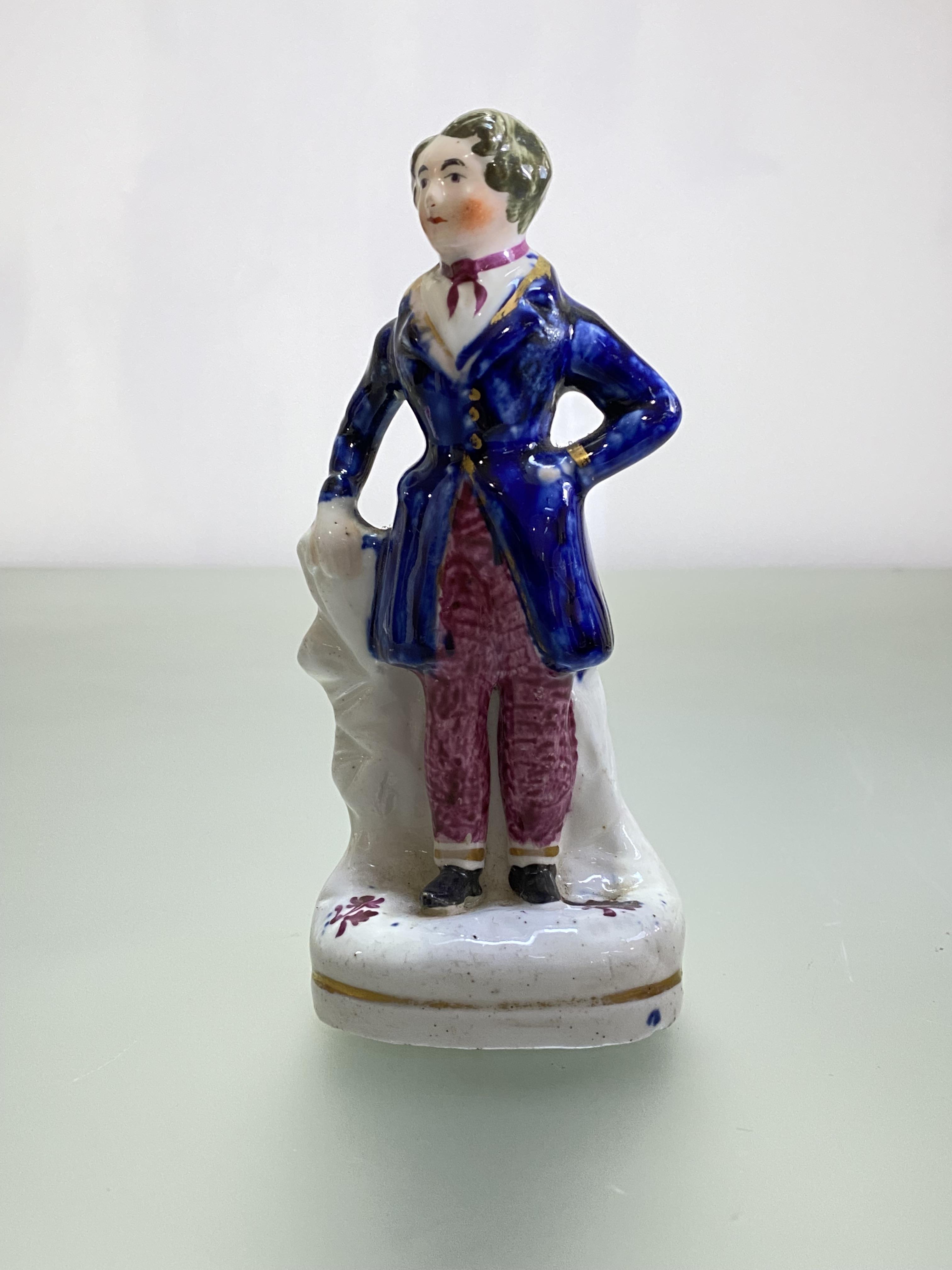 A small Staffordshire figure of Sir Robert Peel, c. 1840. 14cm