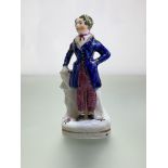 A small Staffordshire figure of Sir Robert Peel, c. 1840. 14cm