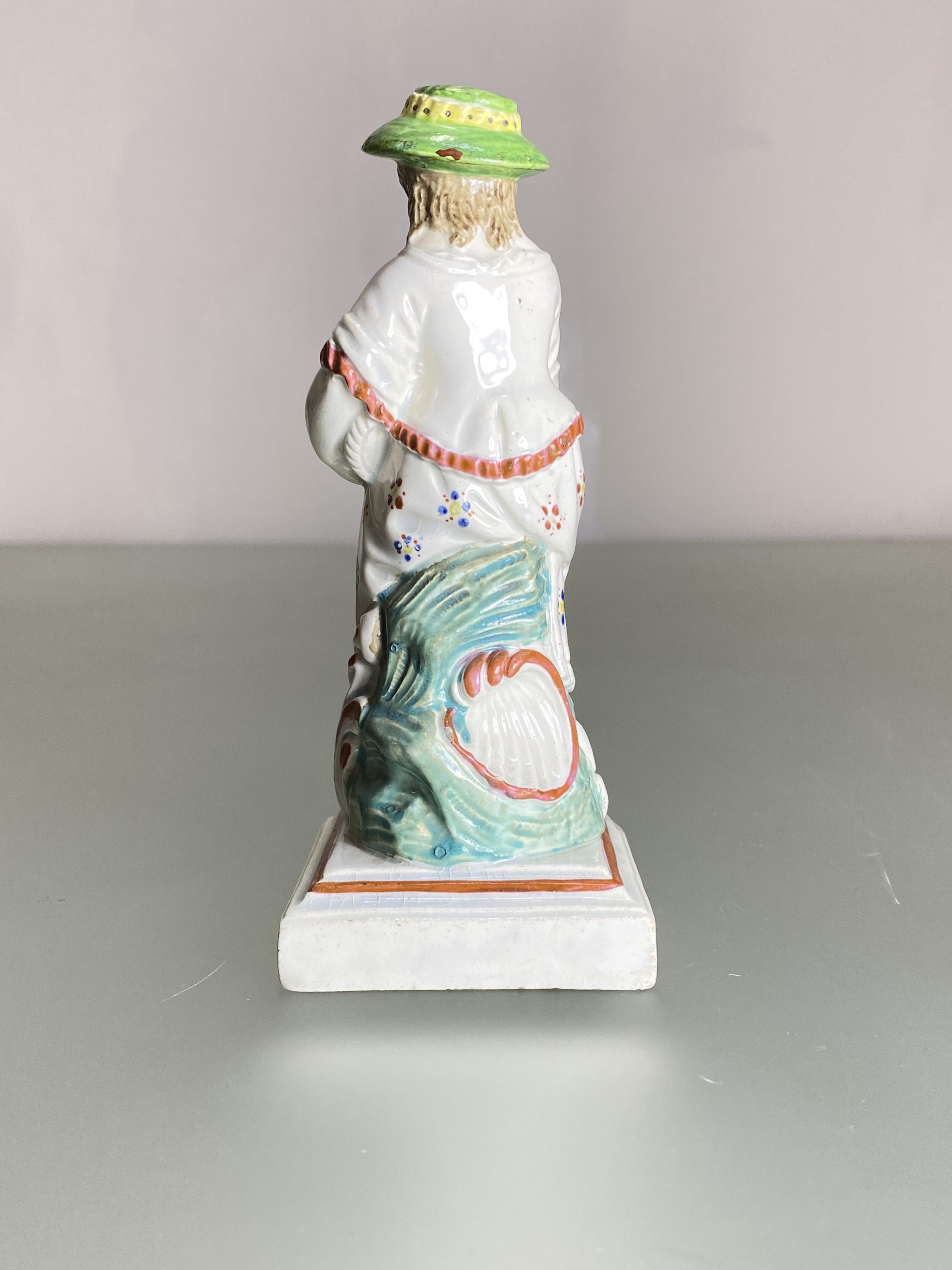 A Staffordshire pearlware figure emblematic of Spring, c. 1800, Wilson, stamped "Wilson / Spring" to - Bild 2 aus 3