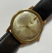 A vintage Longines automatic wind gentleman's wristwatch, the (distressed) silvered dial with