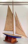 The Saffrey, a large pond yacht, first half of the 20th century, with single mast, simulated planked