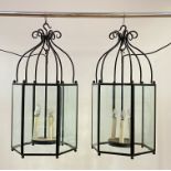 Londsale & Dutch of Edinburgh, a large pair of Regency Crown Design wrought iron hanging lanterns,