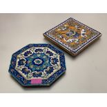 An octagonal pottery tile in an Iznik palette decorated with flowerheads; together with a tin-glazed
