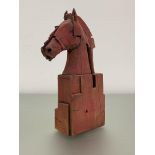 •Christy Keeney (Irish, b. 1958), Horse's Head, a painted clay slabwork sculpture, incised