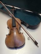 A French violin, c. 1900, the bridge stamped J.T.L., with one piece figured back, cased with an