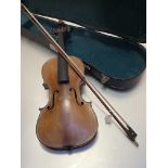 A French violin, c. 1900, the bridge stamped J.T.L., with one piece figured back, cased with an