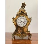 A French Vernis Martin style mantel clock, late 19th century, the case of cartouche form with floral