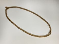 A 9ct gold curblink Albert, with ring fitting for a bracelet. Length of double strand 19.5cm, weight