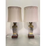 A pair of Chinese brass-mounted pewter table lamps, of shouldered vasiform, on wooden bases and with