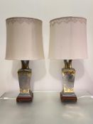 A pair of Chinese brass-mounted pewter table lamps, of shouldered vasiform, on wooden bases and with
