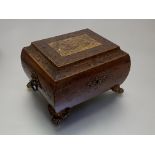 A 19th century gilt-metal mounted inlaid walnut work box, of compressed sarcophagus form, the