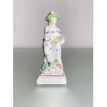 A Staffordshire pearlware figure emblematic of Spring, c. 1800, Wilson, stamped "Wilson / Spring" to